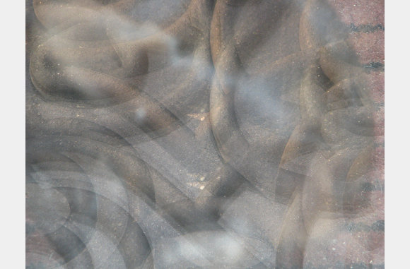 Op deze foto is de rubber mat te zien, gemaakt via het glas van de deur, ergens op de achtergrond zit Lady ook nog.