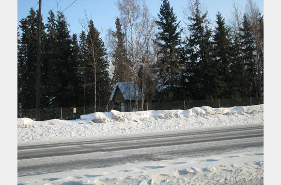 Huisje in de sneeuw
